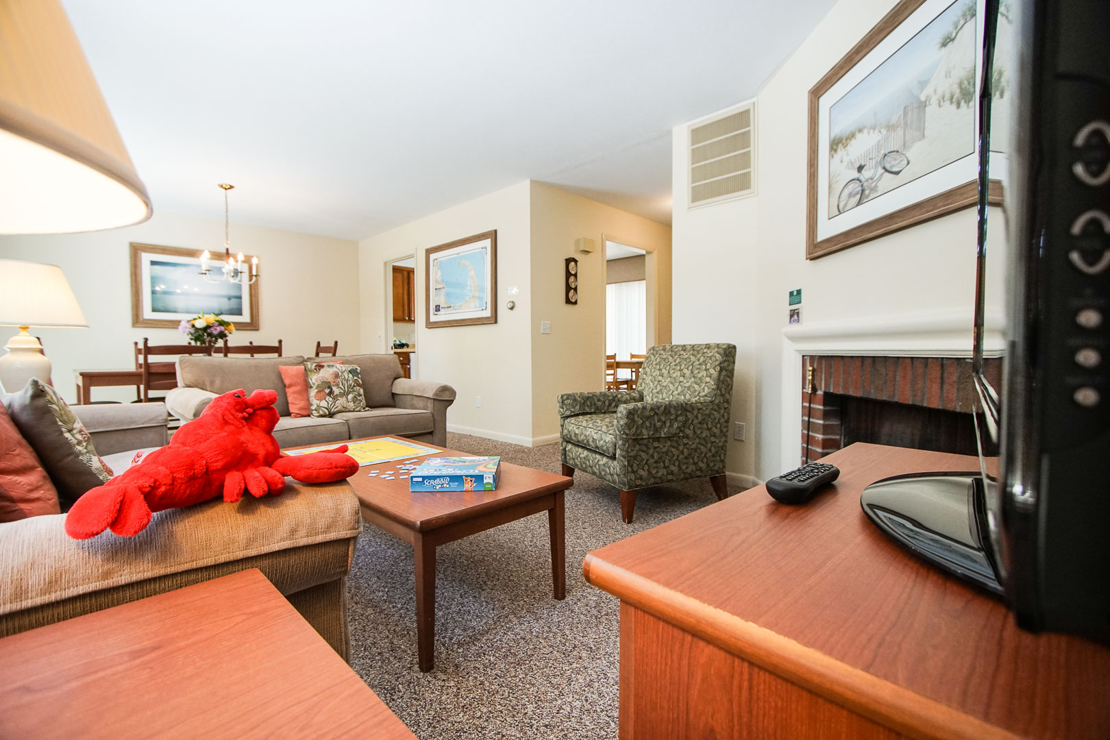 A cozy and spacious living room area at VRI's Brewster Green Resort in Massachusetts.